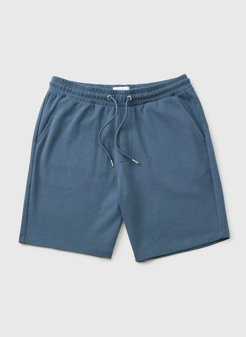 ماتلان شورتات منسقة بنقوش زرقاء